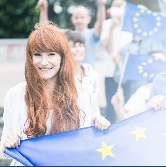 Supporters holding EU flags